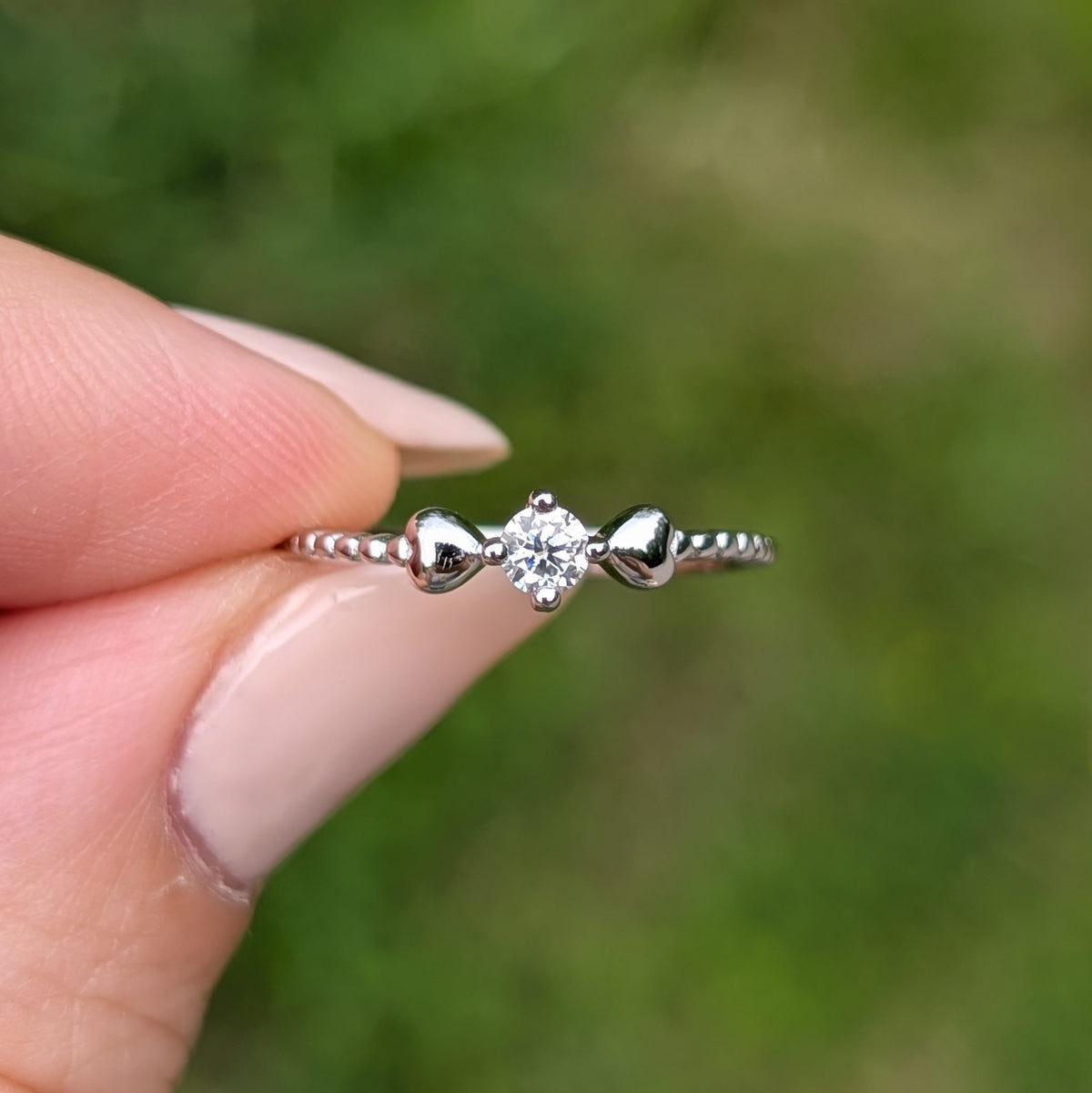 The Petite Amour — 0.1CT Dainty Moissanite Ring with Heart Accents