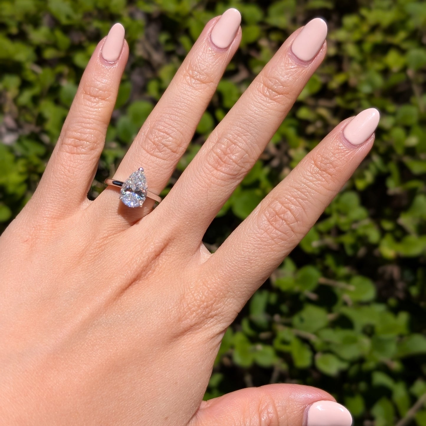 The Beloved Grande — 4CT Pear Cut Moissanite Ring | Heart Detail Band